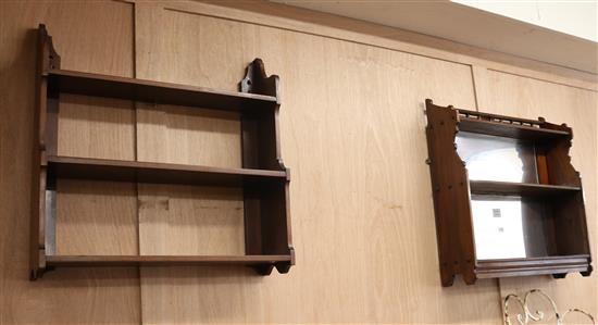 A mahogany three tier wall shelf and a mirrored wall shelf W.59cm